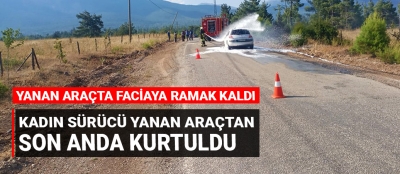 Kadın sürücü yanan araçtan son anda kurtuldu!