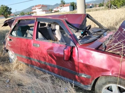 Trafik kazasında otomobil taklalar atarak ekin tarlasına düştü.